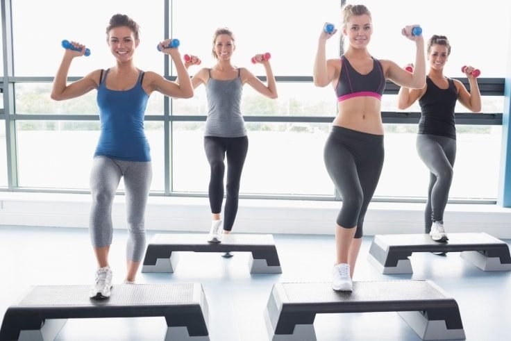 Girls exercising on steppers